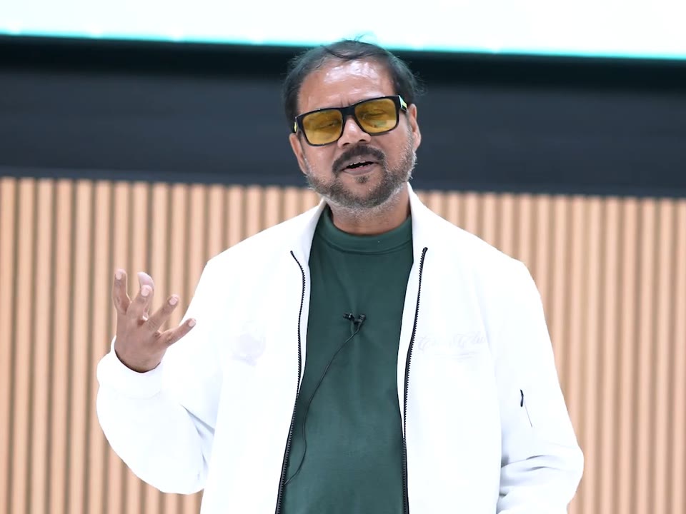A speaker on stage at ScaleME Summit'26, ISB Hyderabad